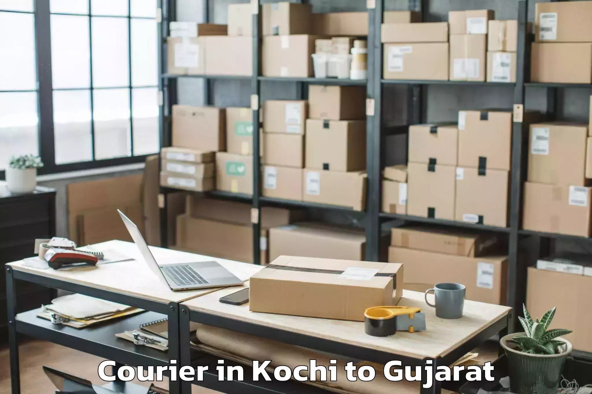 Professional Kochi to Visavadar Courier